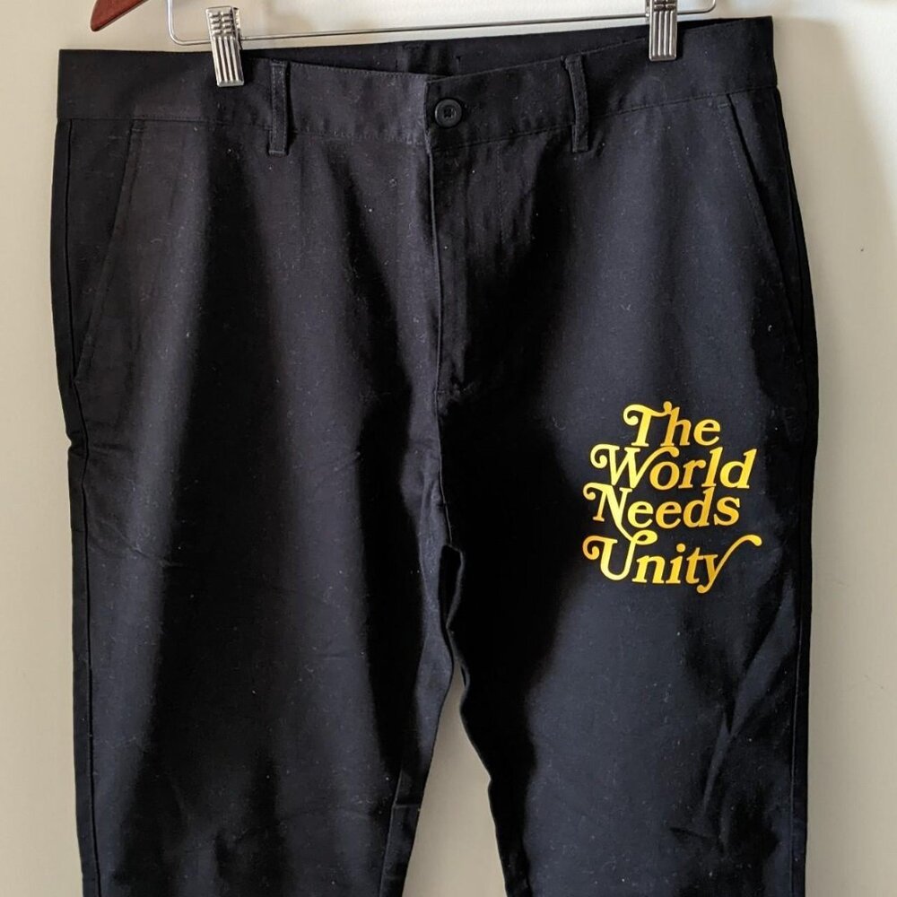 Black & Yellow The World Needs Unity Trousers
